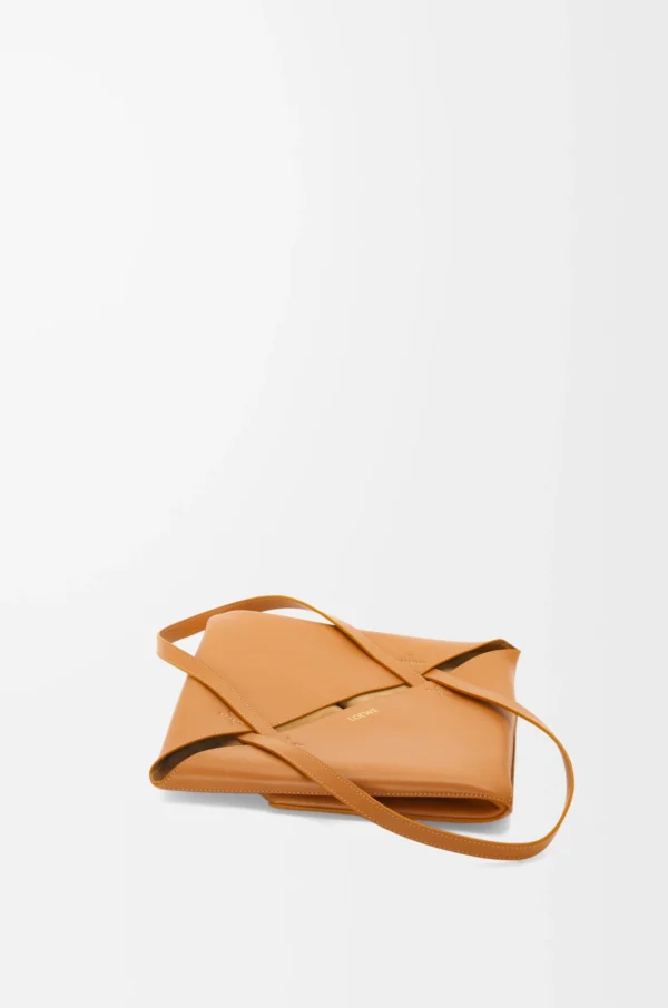 Medium Puzzle Fold tote in shiny calfskin